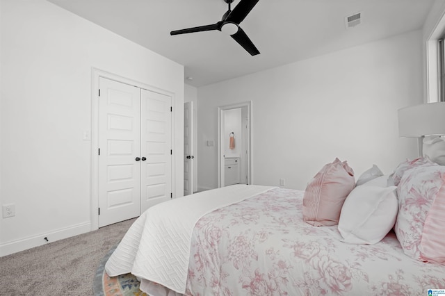 bedroom with ceiling fan, a closet, and carpet floors