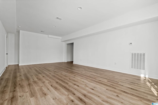 unfurnished room featuring light hardwood / wood-style floors