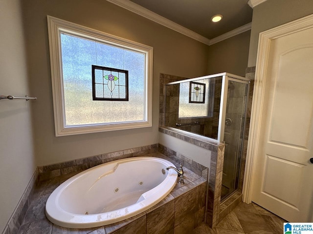 bathroom featuring tile patterned flooring, ornamental molding, and shower with separate bathtub