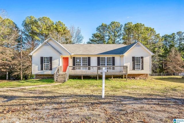 single story home featuring a deck