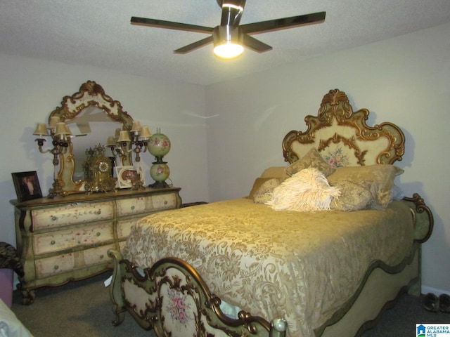 bedroom with carpet flooring, ceiling fan, and a textured ceiling