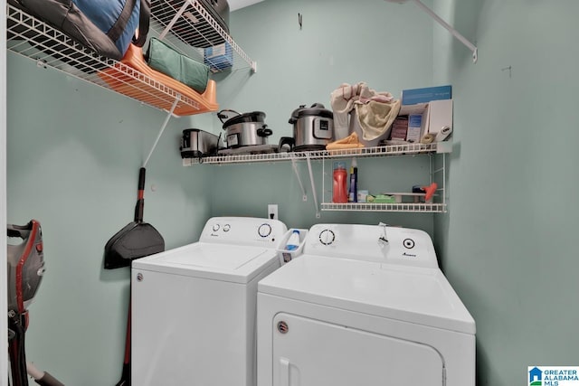 laundry area featuring washer and clothes dryer