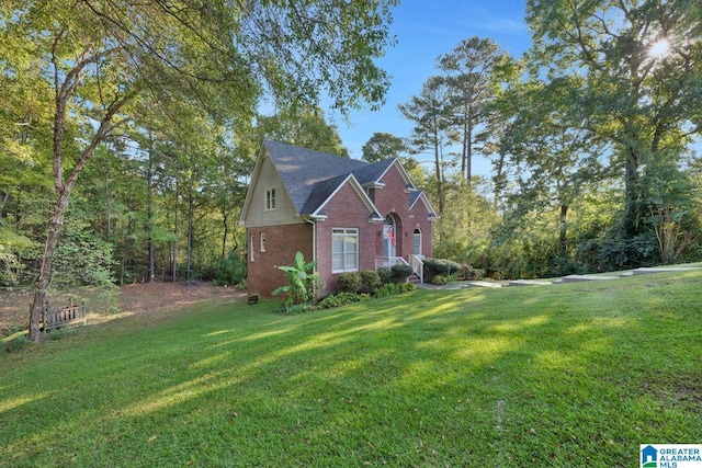 view of property exterior featuring a lawn