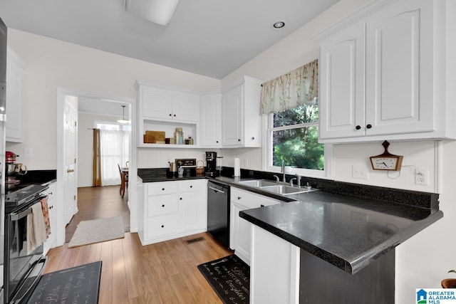 kitchen with kitchen peninsula, dishwasher, white cabinets, and stove