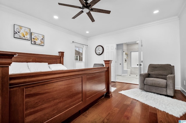 bedroom featuring ensuite bathroom, crown molding, ceiling fan, and dark hardwood / wood-style floors