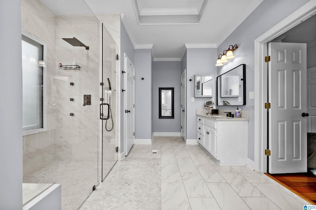 bathroom with vanity, a shower with door, and ornamental molding