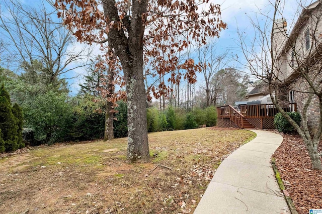 view of yard featuring a deck