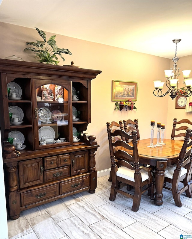 dining area with a chandelier