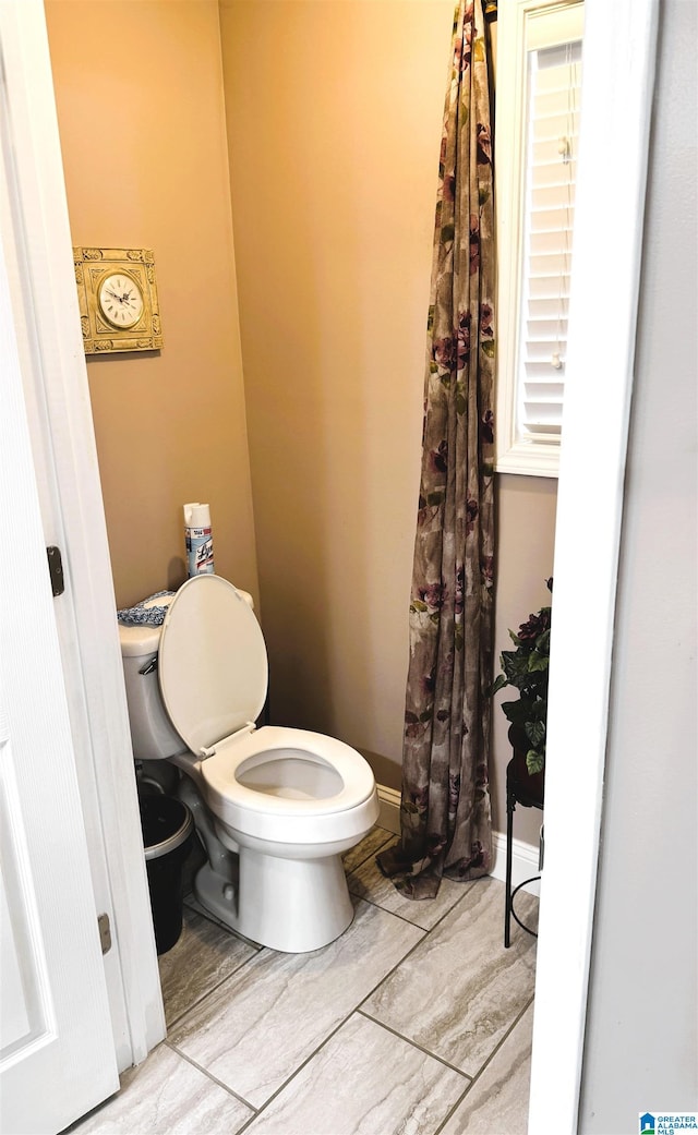 bathroom featuring toilet