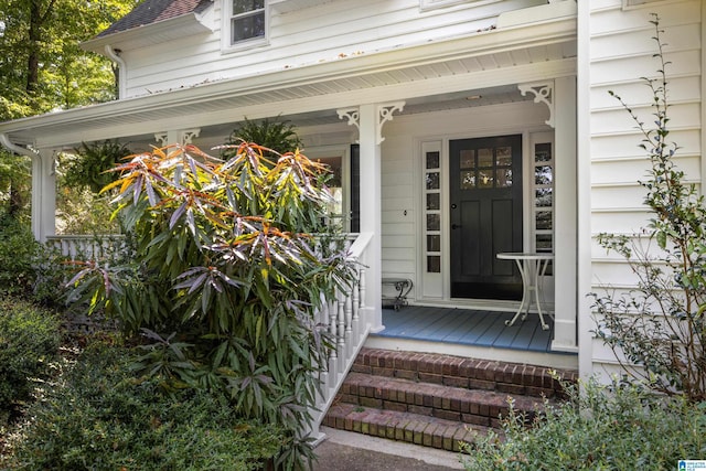 entrance to property with a porch