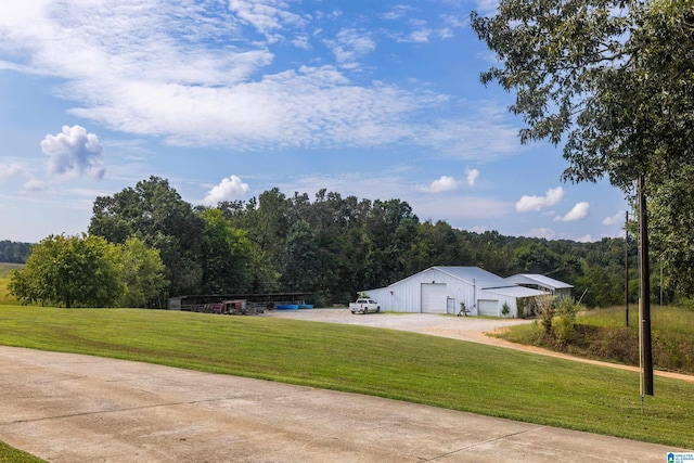 view of yard with a garage