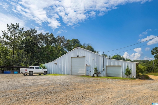 view of outdoor structure with a garage