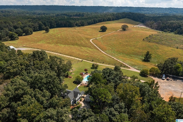 birds eye view of property featuring a rural view