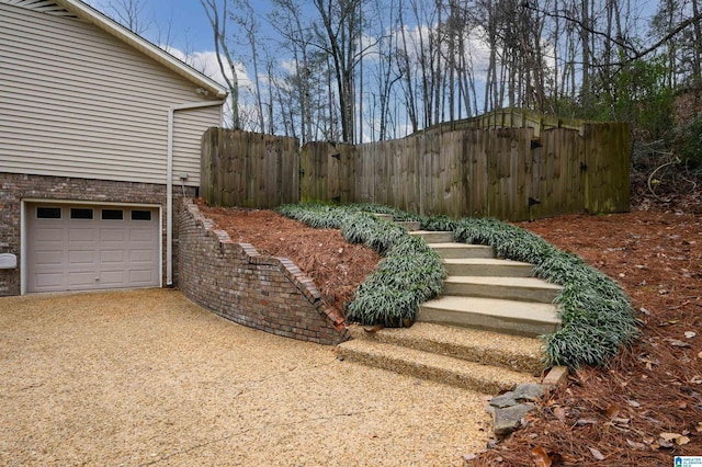 view of yard featuring a garage