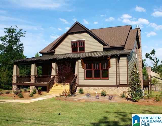 view of front of home with a front yard