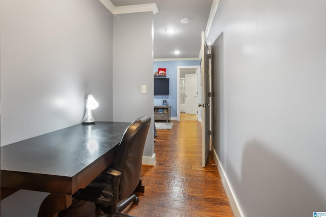 interior space featuring dark hardwood / wood-style flooring and ornamental molding