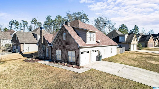 view of front facade featuring a front yard, a garage, and central AC unit