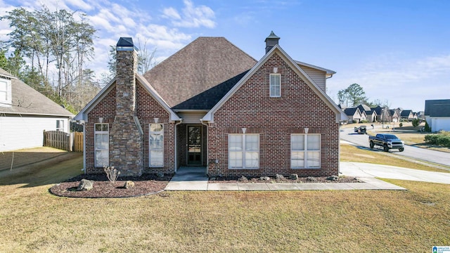 view of front facade with a front lawn