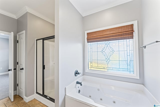 bathroom featuring tile patterned floors, ornamental molding, and independent shower and bath