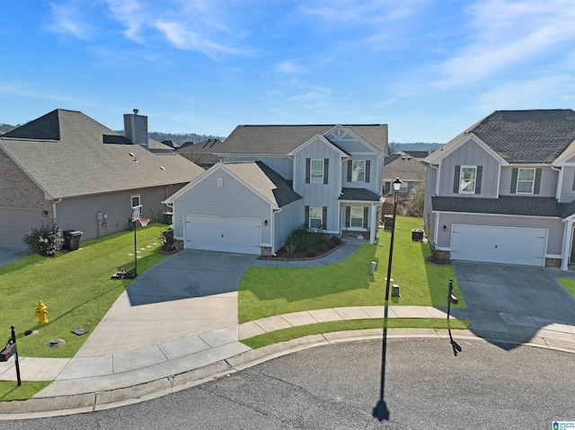 front of property featuring a garage and a front yard