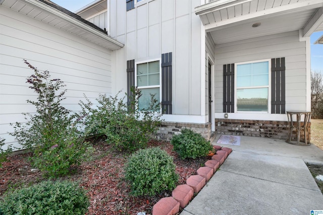 entrance to property with a patio area