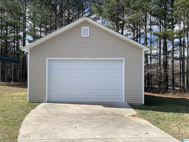 garage with a yard