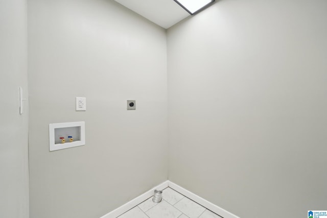 laundry room with washer hookup, electric dryer hookup, and light tile patterned flooring