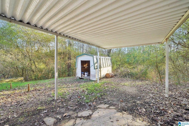 view of patio featuring a storage unit