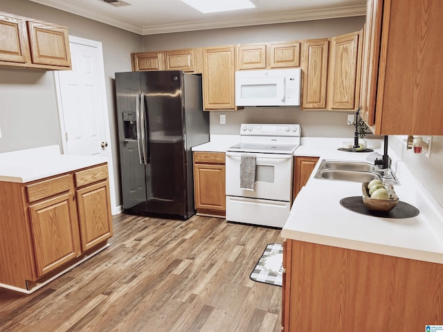 kitchen with sink, light hardwood / wood-style flooring, white appliances, and ornamental molding