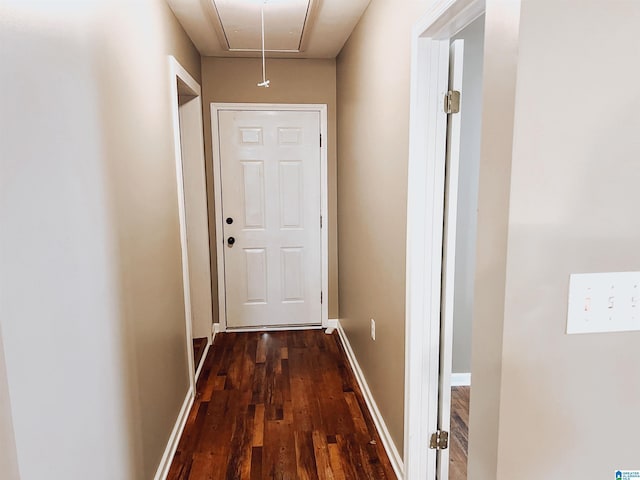 corridor featuring dark wood-type flooring