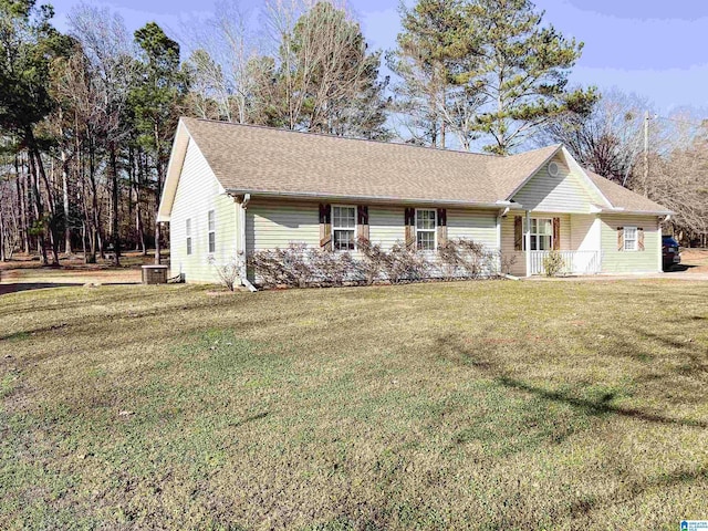 single story home featuring a front lawn and cooling unit