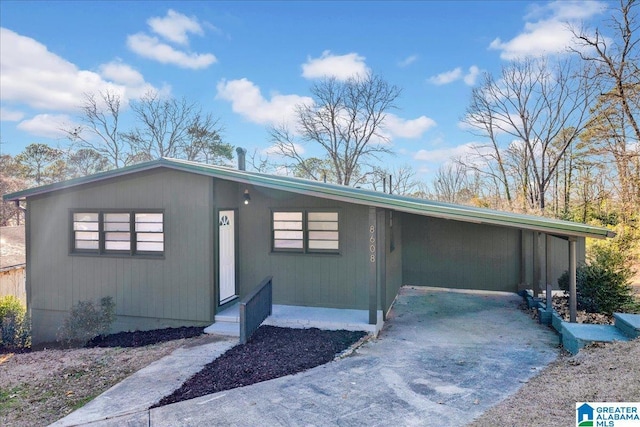 view of front facade with a carport