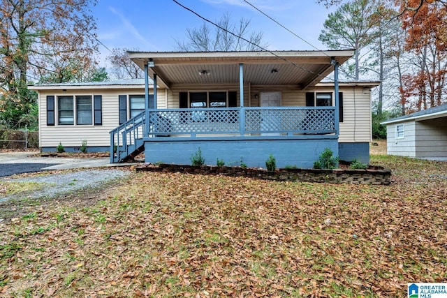 view of front of home featuring covered porch