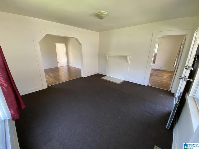 interior space with dark hardwood / wood-style flooring