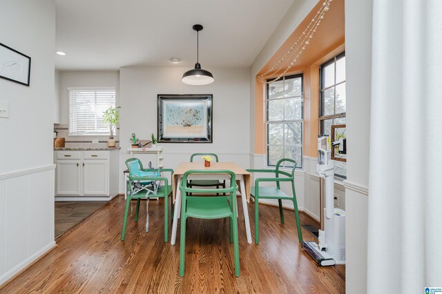 dining room with hardwood / wood-style floors