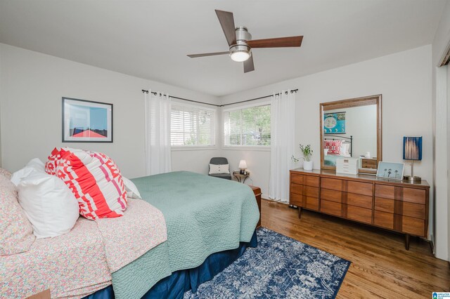 bedroom featuring ceiling fan and hardwood / wood-style floors