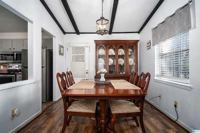 dining area with lofted ceiling with beams, dark hardwood / wood-style floors, and an inviting chandelier