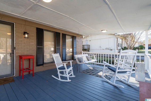 deck featuring covered porch