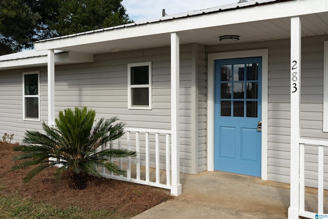 property entrance with a porch