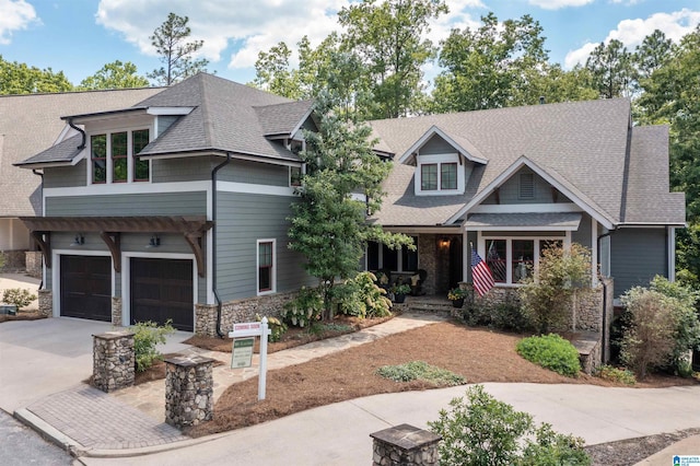 craftsman house with a garage