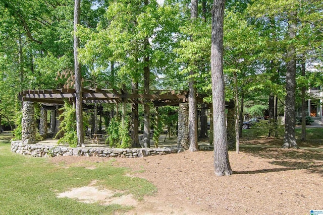 exterior space with a pergola