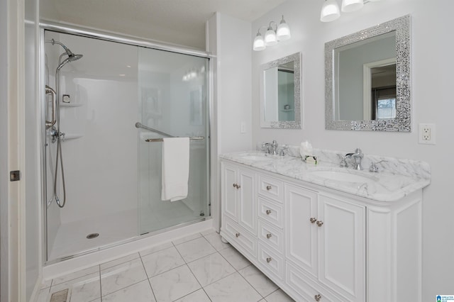 bathroom with vanity and walk in shower