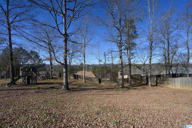 view of yard featuring a playground