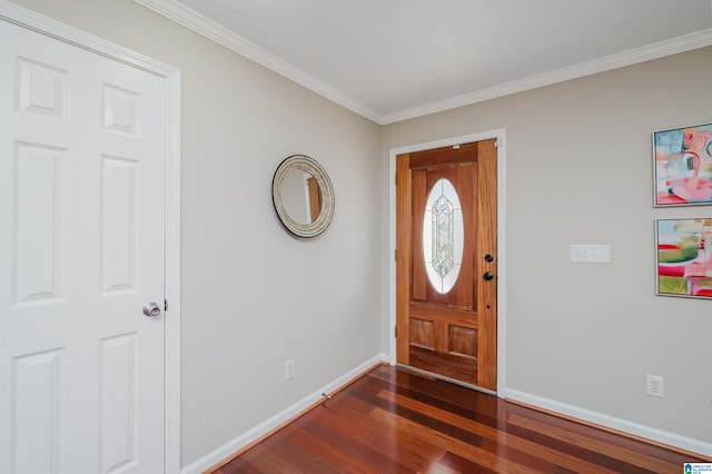 foyer featuring crown molding and dark wood-type flooring