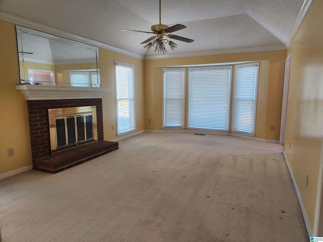 unfurnished living room featuring light carpet, ornamental molding, a brick fireplace, and lofted ceiling