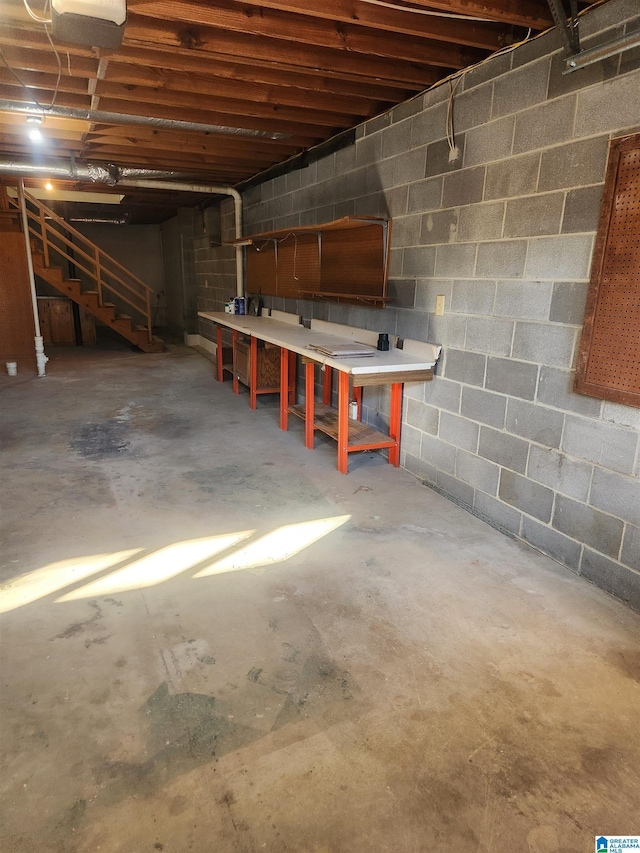 basement with a workshop area