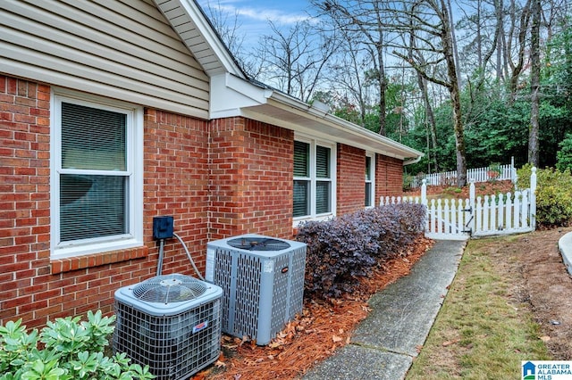 view of home's exterior featuring central air condition unit