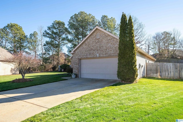 view of side of home featuring a garage, an outbuilding, and a lawn