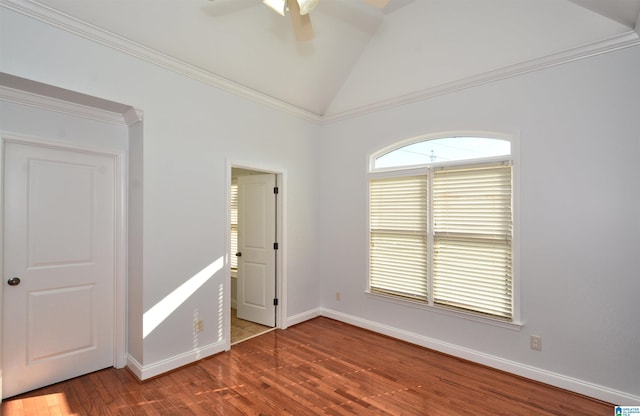 unfurnished room featuring ceiling fan, hardwood / wood-style floors, crown molding, and lofted ceiling