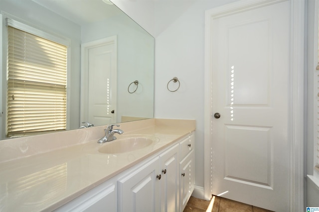 bathroom with vanity and tile patterned floors